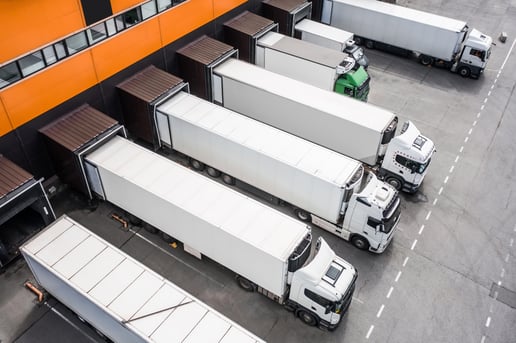 aerial-view-of-semi-trucks-at-loading-dock; moving your freight agency to a new brokerage; Sureway; Sureway Transportation Company